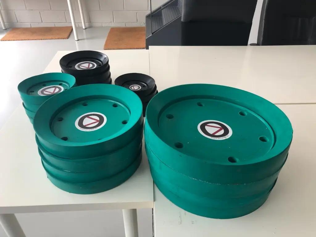 Stacked Propipe Viton sealing elements displayed on a white table